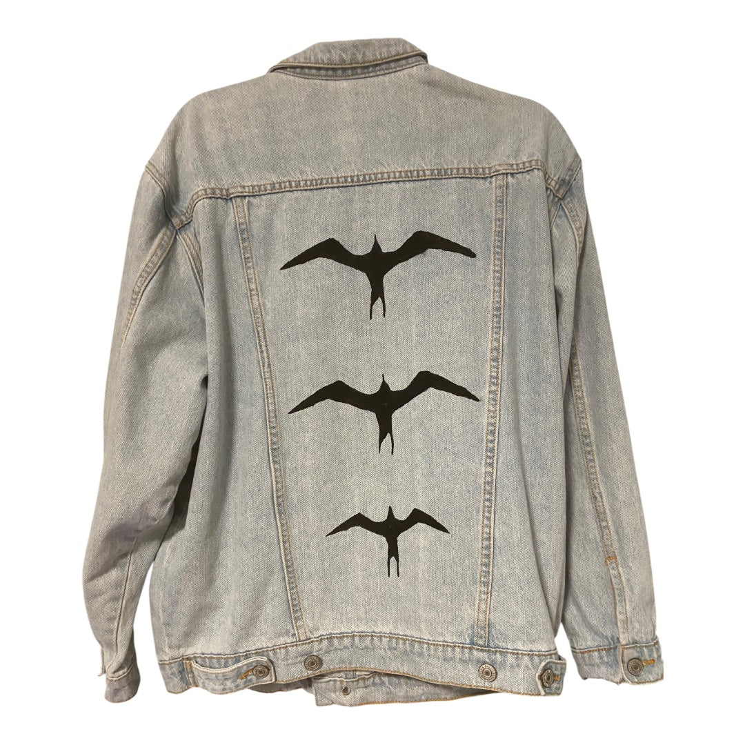 Hand-painted Black Iwa Bird on light-wash upcycled denim jacket crafted in Hawai‘i by Culture Girl Boutique