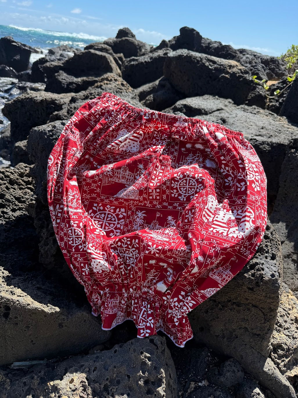 Culture Girl Mom Fit top in red Merrie Monarch print