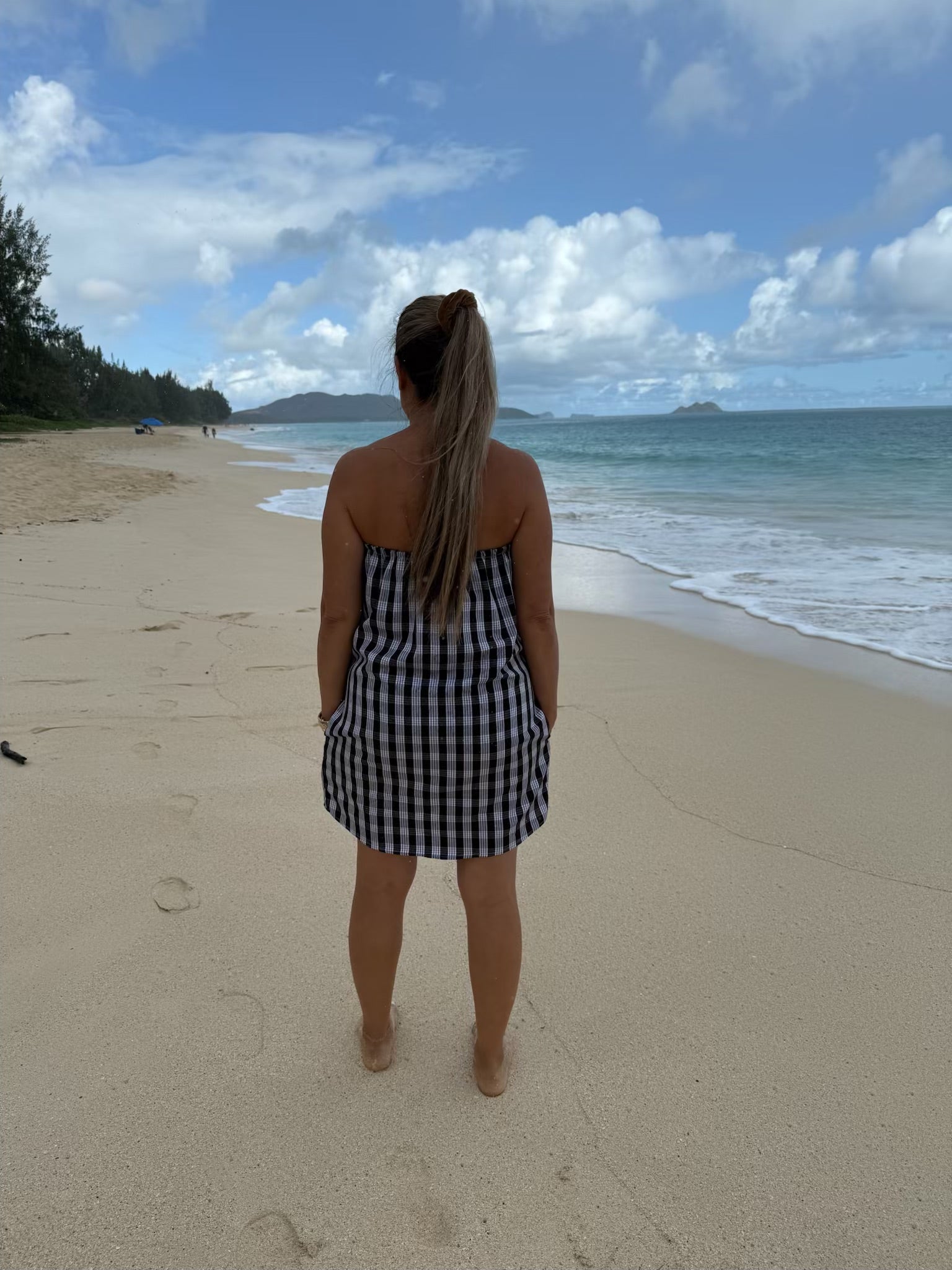 Culture Girl Boutique owner wearing black palaka strapless dress