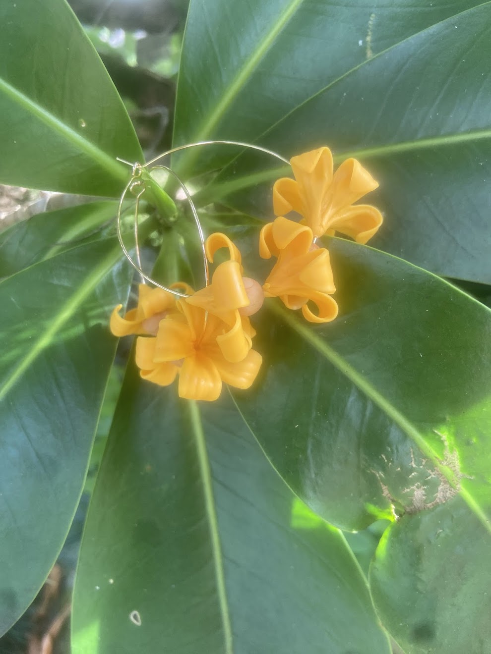 Culture Girl handmade, clay yellow puakenekene hoop earrings
