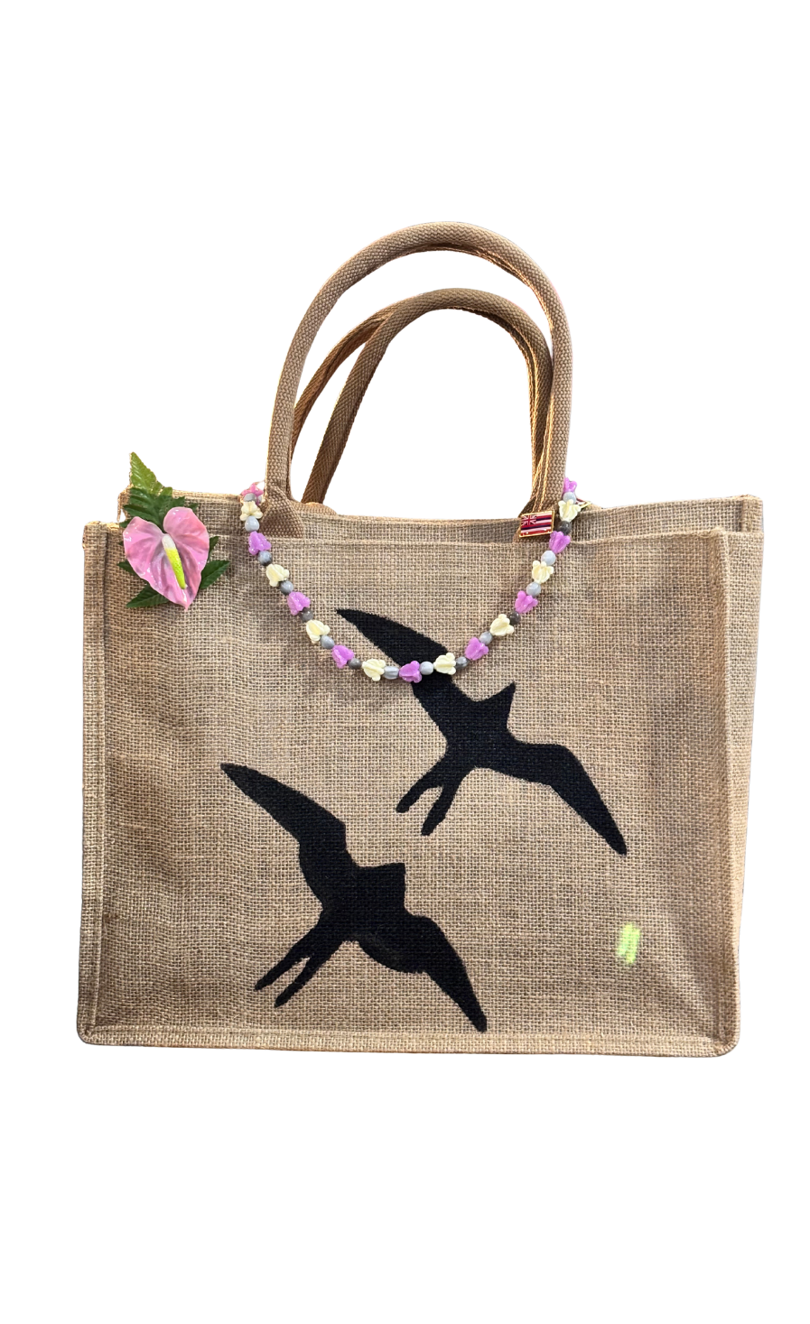 Recyclable khaki colored tote bag with Iwa Bird print design and decorations